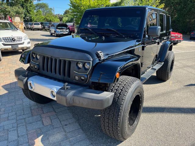 used 2014 Jeep Wrangler Unlimited car, priced at $22,875