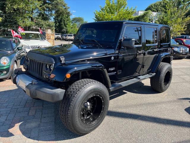 used 2014 Jeep Wrangler Unlimited car, priced at $22,875