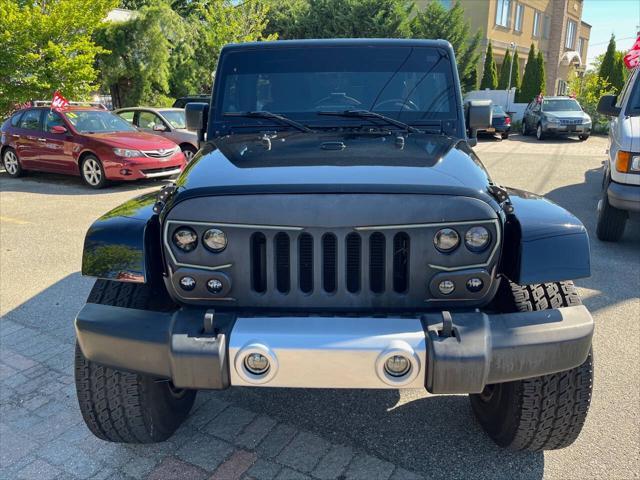 used 2014 Jeep Wrangler Unlimited car, priced at $22,875