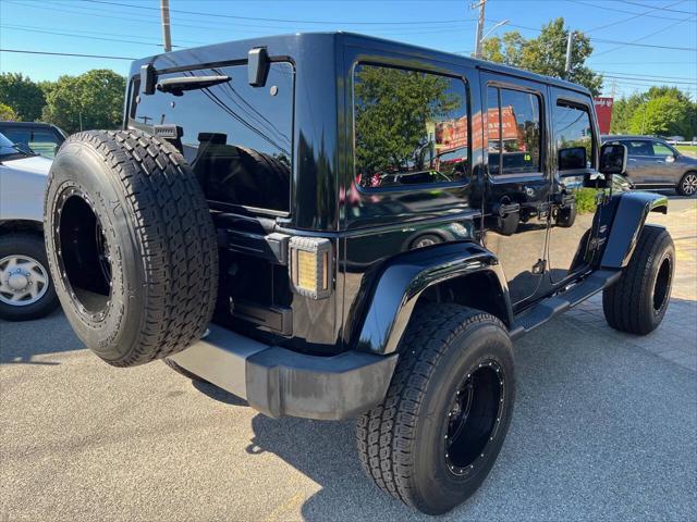 used 2014 Jeep Wrangler Unlimited car, priced at $22,875