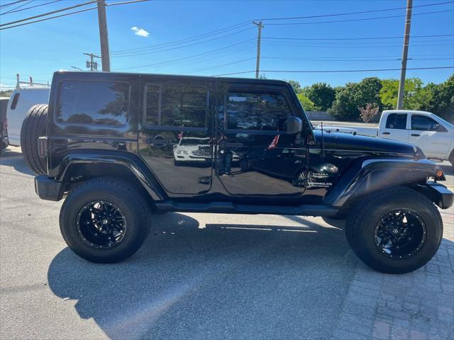 used 2014 Jeep Wrangler Unlimited car, priced at $22,875