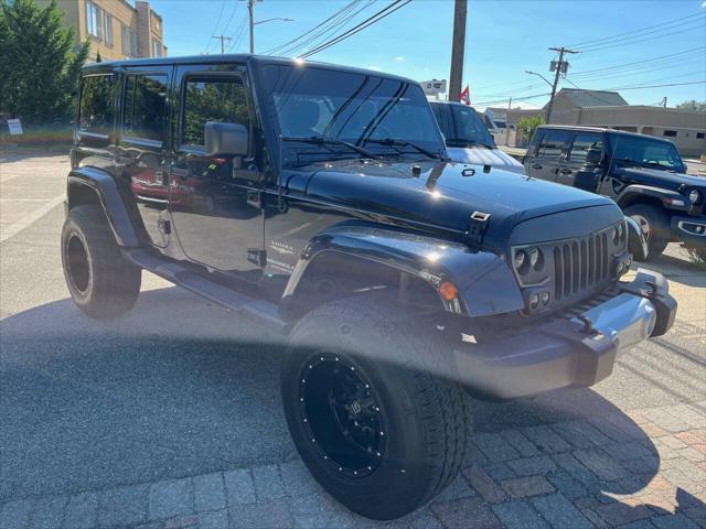 used 2014 Jeep Wrangler Unlimited car, priced at $22,875