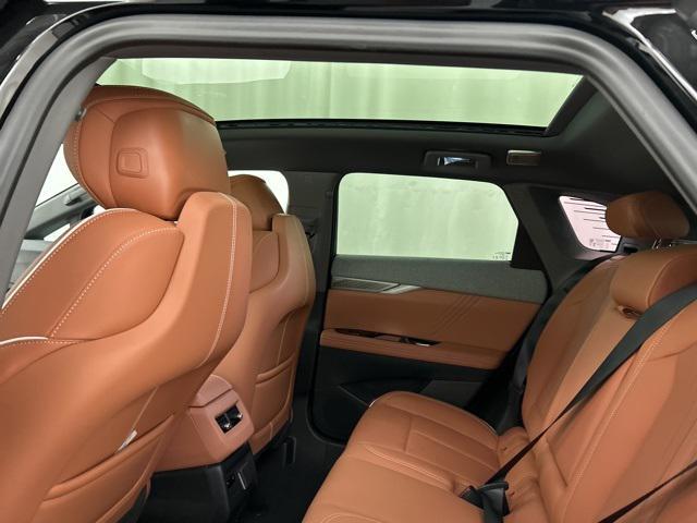 new 2025 Cadillac OPTIQ car, priced at $58,065
