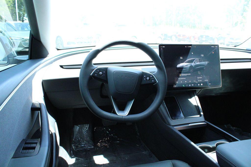 used 2024 Tesla Model 3 car, priced at $37,988