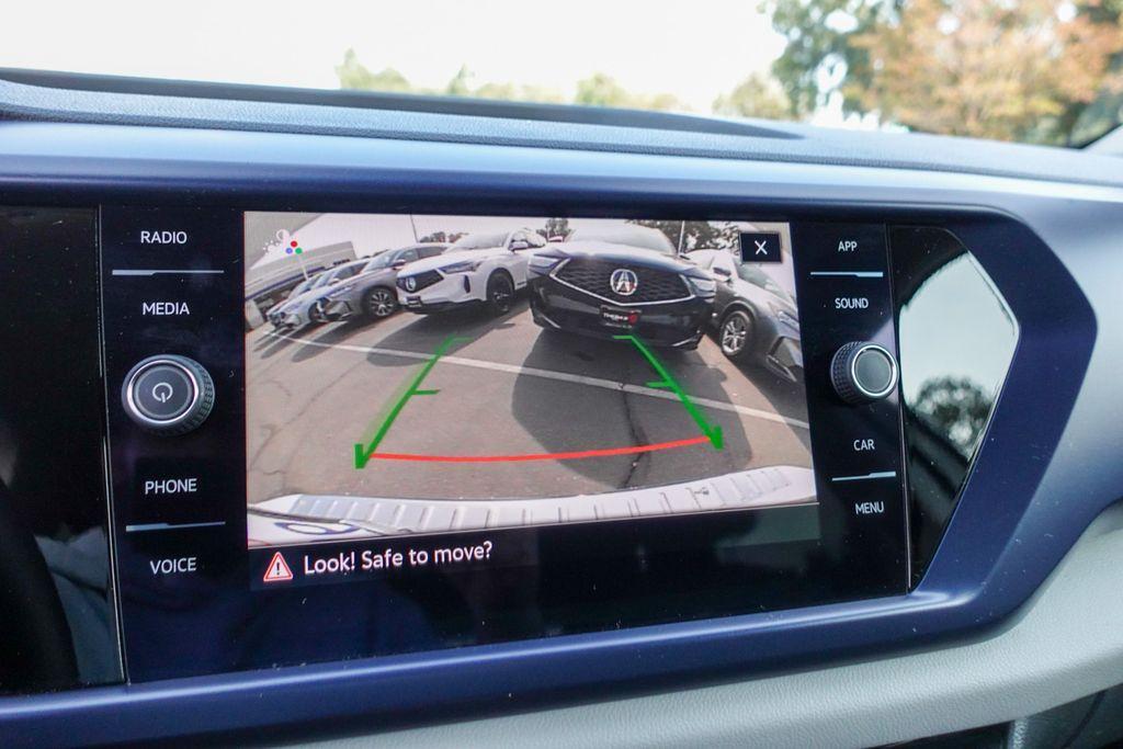 used 2023 Volkswagen Taos car, priced at $17,860