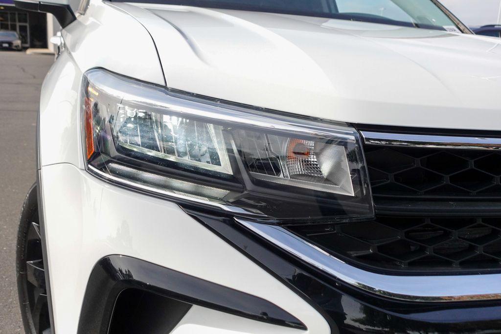 used 2023 Volkswagen Taos car, priced at $17,860