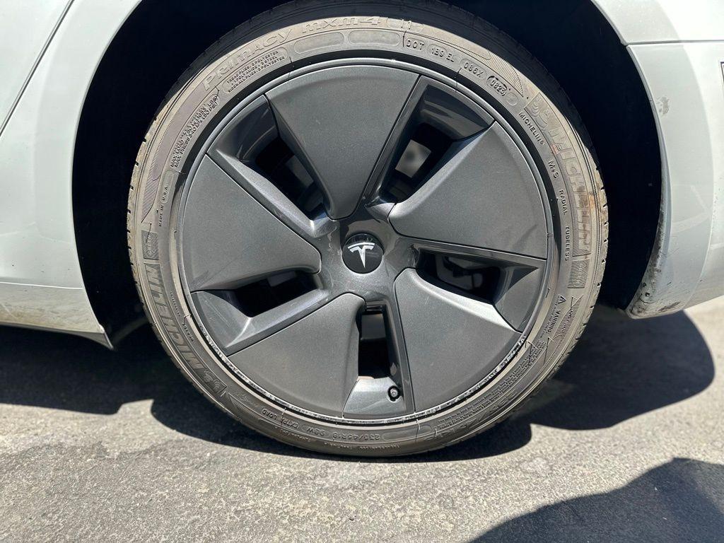 used 2023 Tesla Model 3 car, priced at $27,995