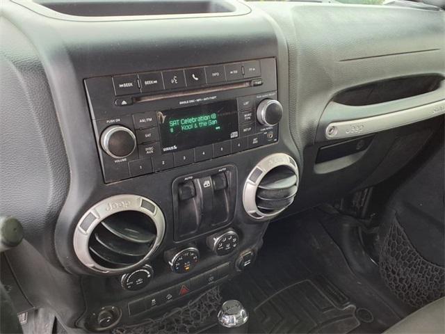 used 2015 Jeep Wrangler car, priced at $17,404