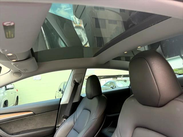 used 2023 Tesla Model 3 car, priced at $29,900