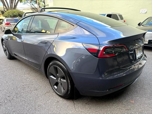 used 2023 Tesla Model 3 car, priced at $29,900