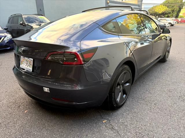 used 2023 Tesla Model 3 car, priced at $29,900