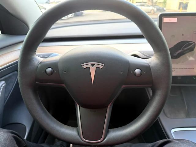 used 2023 Tesla Model 3 car, priced at $29,900