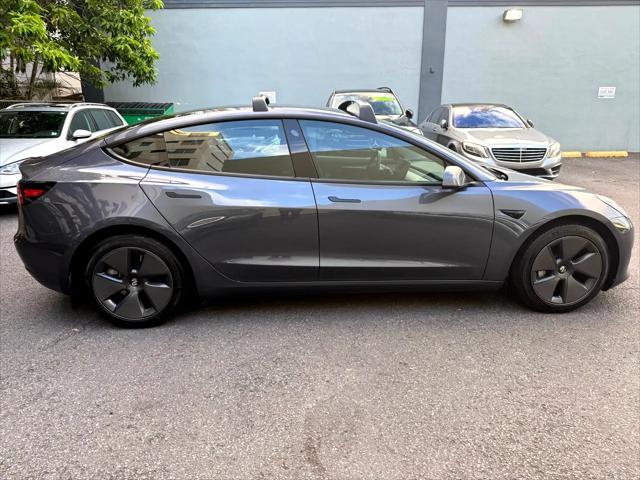 used 2023 Tesla Model 3 car, priced at $29,900