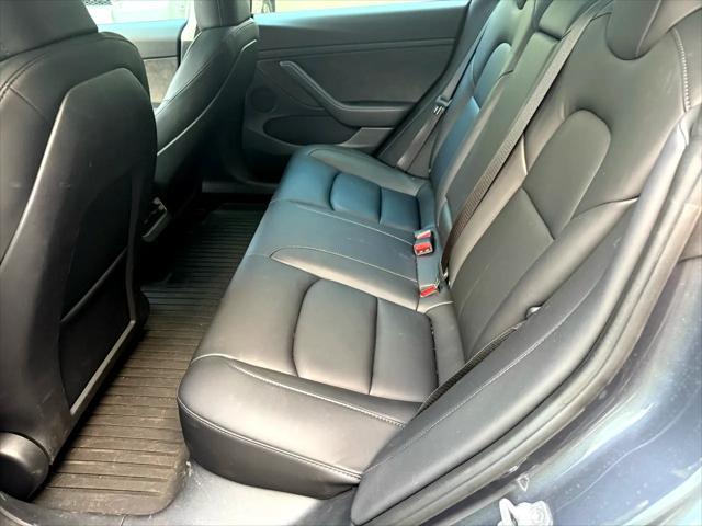 used 2023 Tesla Model 3 car, priced at $29,900