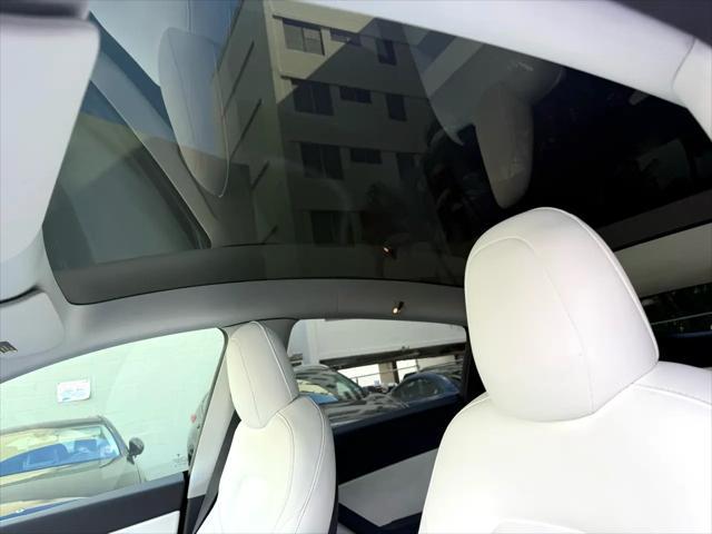 used 2021 Tesla Model Y car, priced at $33,900