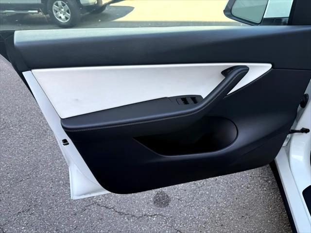 used 2021 Tesla Model Y car, priced at $33,900