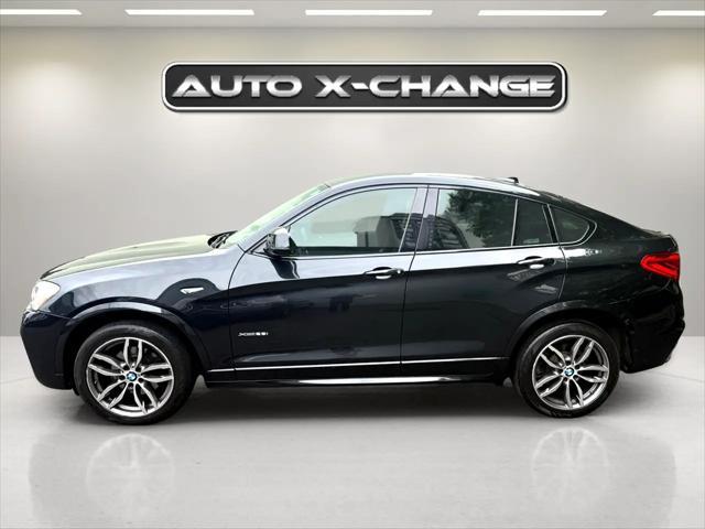 used 2016 BMW X4 car, priced at $17,900