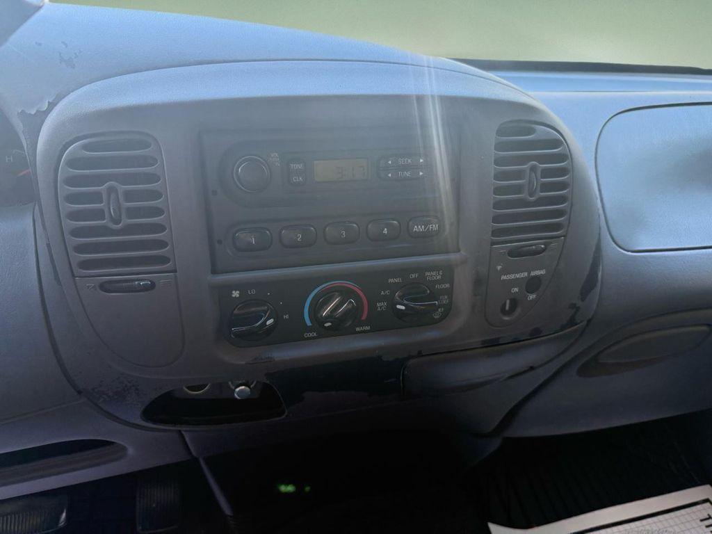 used 1999 Ford F-150 car, priced at $4,988