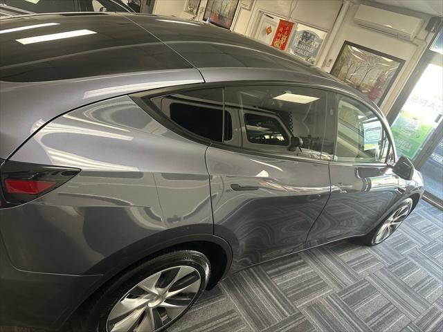 used 2023 Tesla Model Y car, priced at $38,900