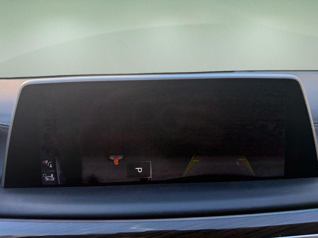 used 2016 BMW 750 car, priced at $29,900