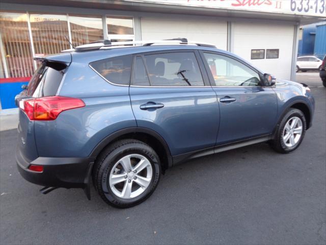 used 2013 Toyota RAV4 car, priced at $13,000