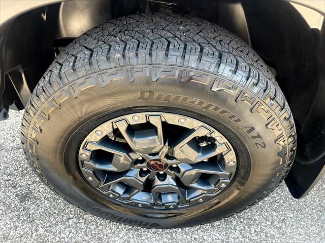 used 2024 Nissan Frontier car, priced at $37,500