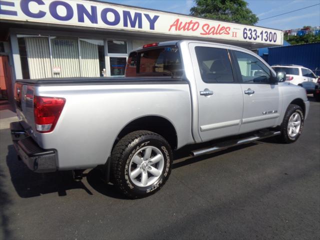 used 2011 Nissan Titan car, priced at $15,000