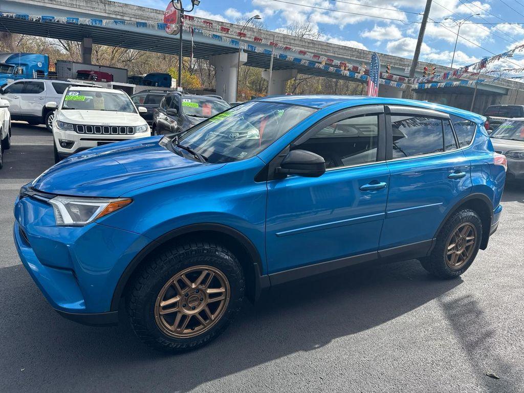 used 2018 Toyota RAV4 car, priced at $16,000