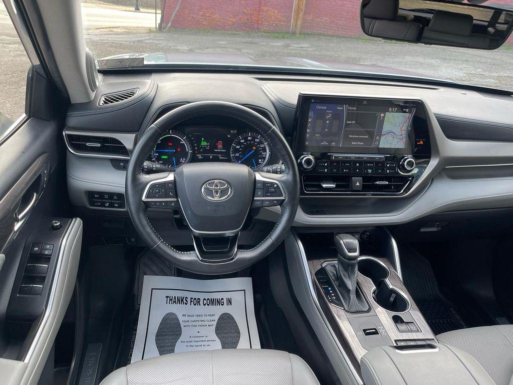 used 2021 Toyota Highlander Hybrid car, priced at $29,999