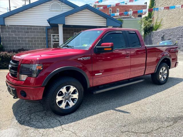 used 2014 Ford F-150 car, priced at $21,000