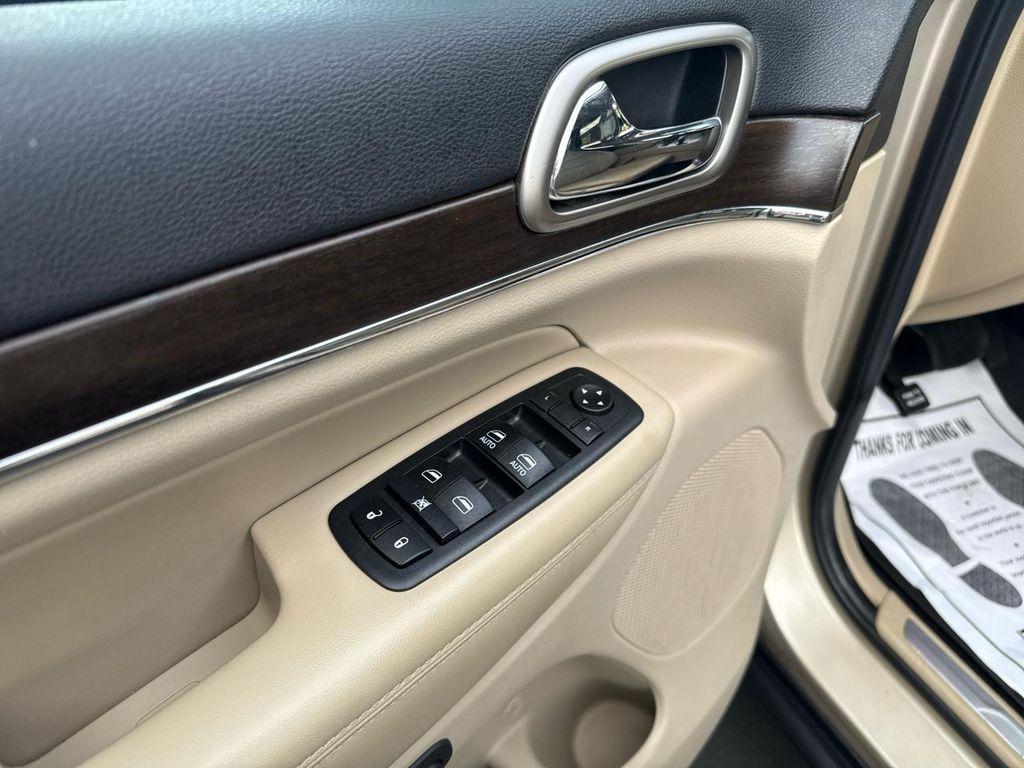 used 2014 Jeep Grand Cherokee car, priced at $13,900
