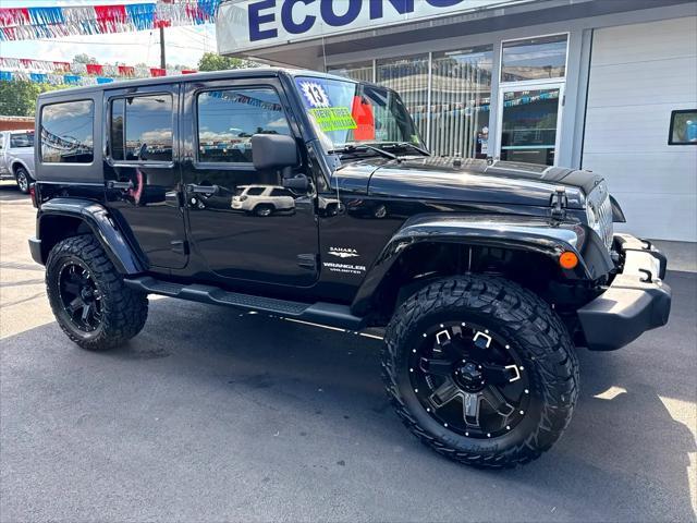used 2013 Jeep Wrangler Unlimited car, priced at $19,900