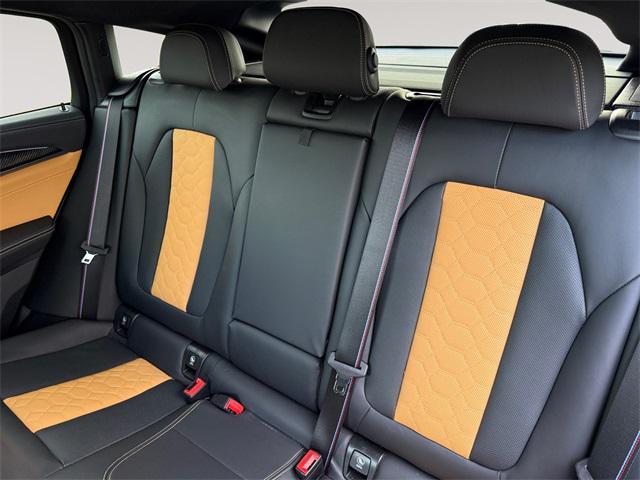 used 2023 BMW X4 M car, priced at $70,292
