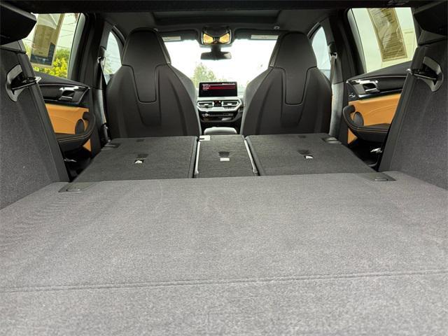 used 2023 BMW X4 M car, priced at $65,192