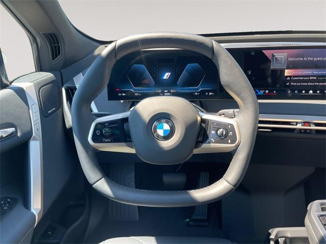 new 2026 BMW iX car, priced at $83,570