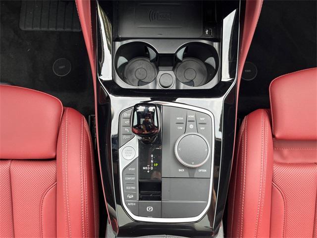 used 2025 BMW X4 car, priced at $52,996