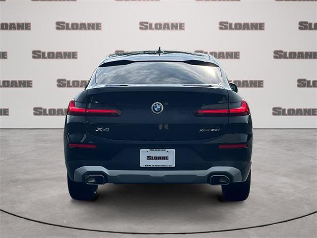 used 2025 BMW X4 car, priced at $52,996