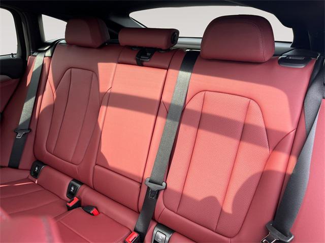 used 2025 BMW X4 car, priced at $52,996