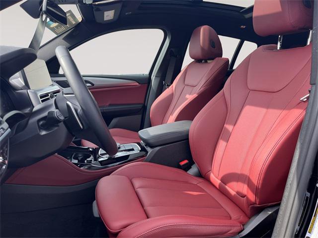 used 2025 BMW X4 car, priced at $52,996