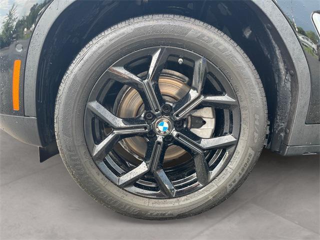 used 2025 BMW X4 car, priced at $52,996
