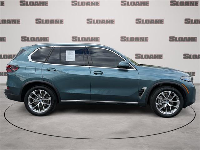 used 2024 BMW X5 car, priced at $63,192