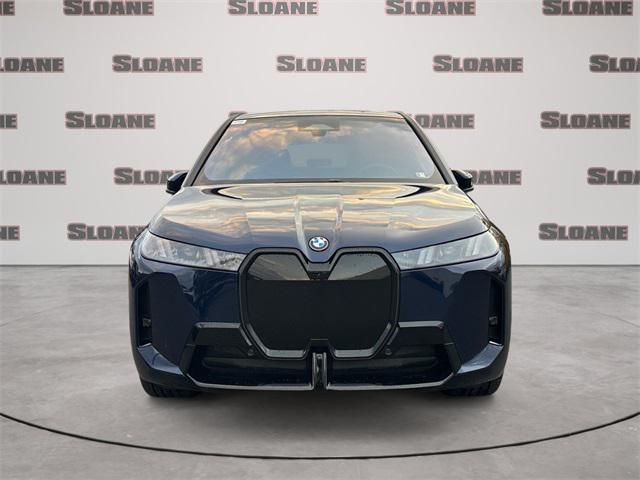 new 2026 BMW iX car, priced at $91,295