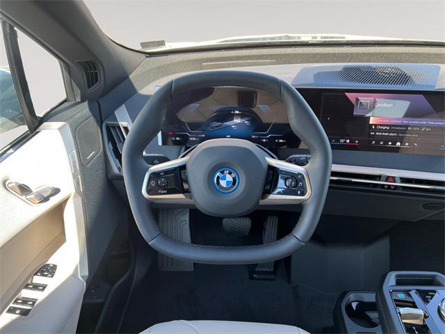 new 2025 BMW iX car, priced at $98,725