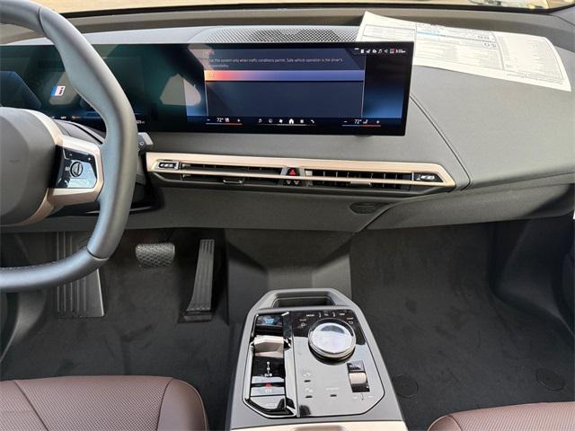 new 2026 BMW iX car, priced at $97,225