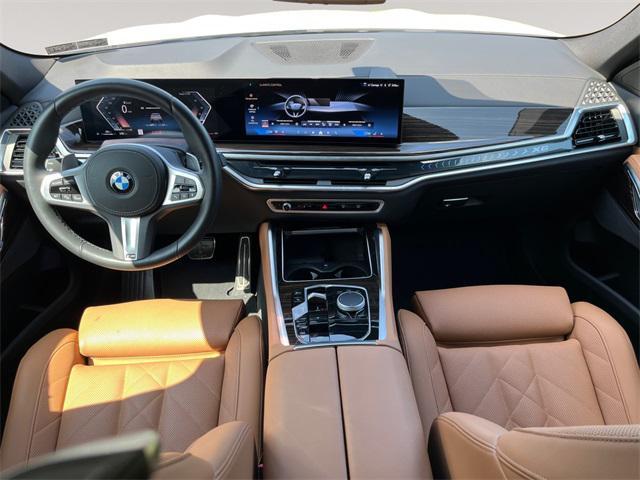 used 2025 BMW X6 car, priced at $72,991