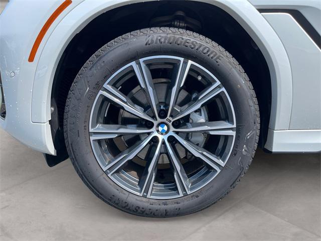 used 2025 BMW X6 car, priced at $72,991