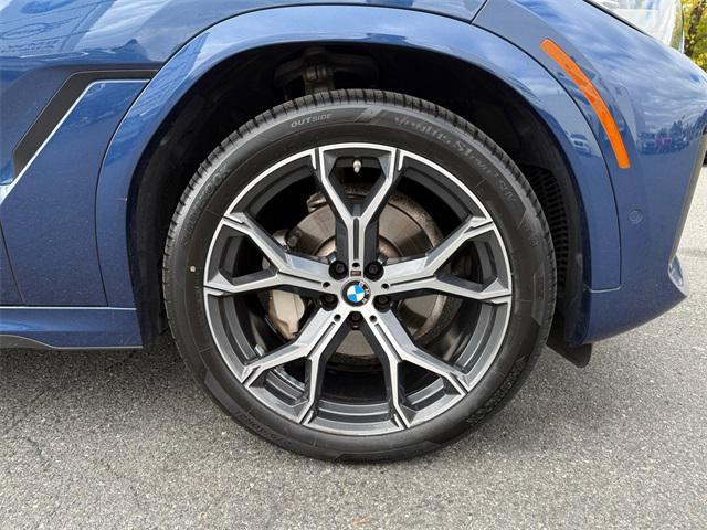 used 2023 BMW X6 car, priced at $55,692