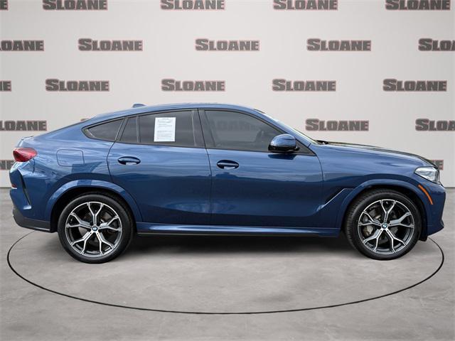 used 2023 BMW X6 car, priced at $55,692