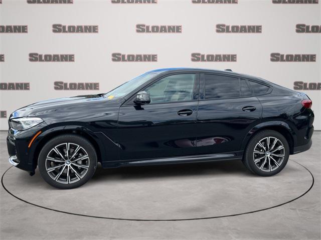 used 2023 BMW X6 car, priced at $56,192