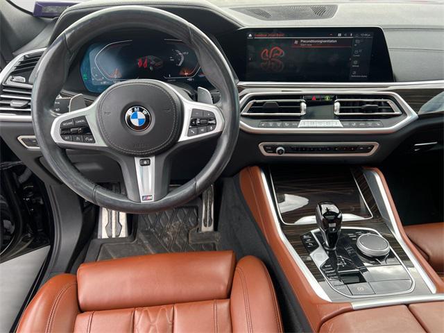 used 2023 BMW X6 car, priced at $56,192